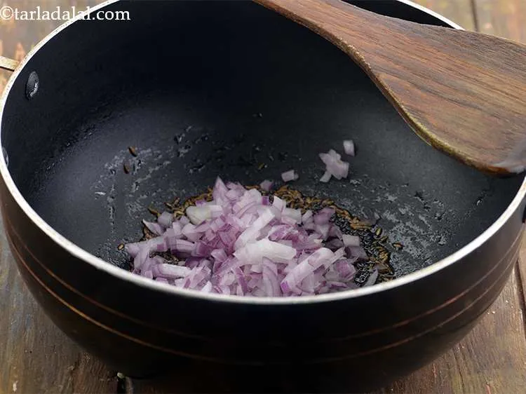 Step 13 – After the seeds start crackling ,add the finely chopped onions and saute well for 2 …
