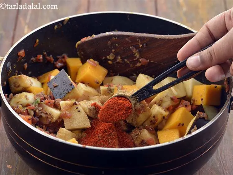 Step 22 – Add the chilli powder for the spice.