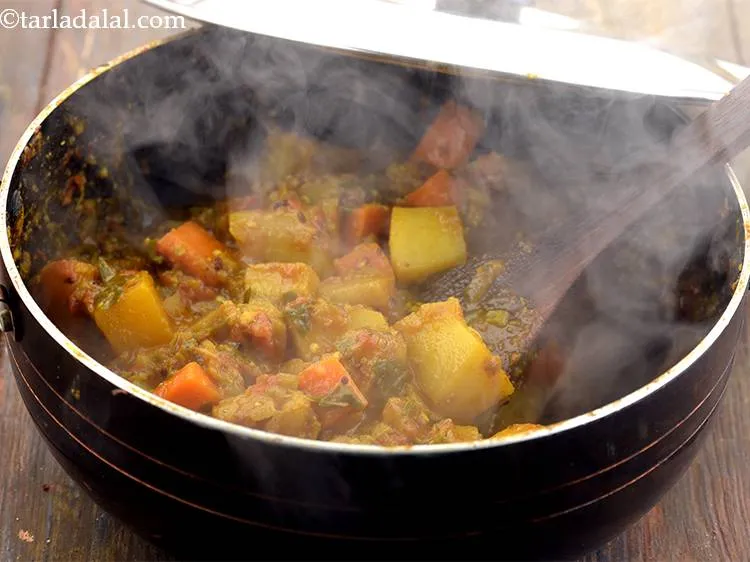 Step 26 – Cook for 15-18 minutes till all the vegetables are tender. You can check the tenderness …