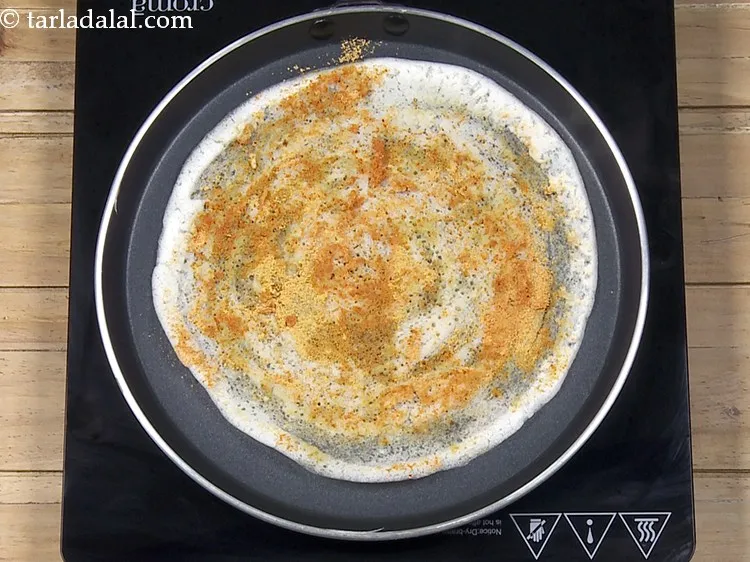 Step 32 – Again cook <strong>roast dosa Kerala style</strong> on a medium flame for 1 minute.