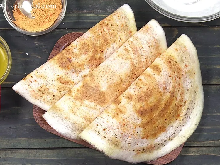 Step 34 – Repeat with the remaining batter to make 4 more <strong>ney roast dosa</strong>.