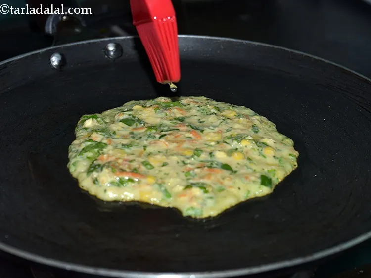 Step 31 – Cook the bottom side till light brown on a low flame. While cooking if the …