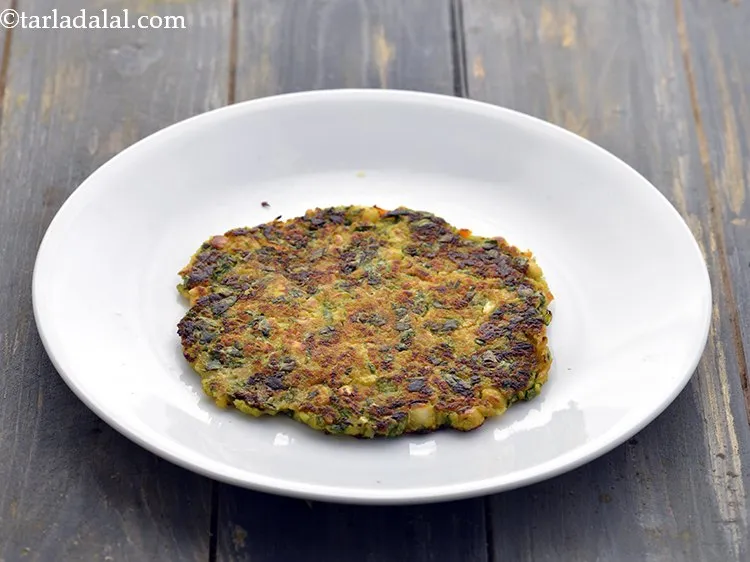 Step 33 – Remove the&nbsp;<strong>chana dal pancake</strong>&nbsp;in a plate.