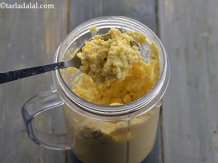 Step 15 – Blend the soaked and drained chana dal to a coarse paste.