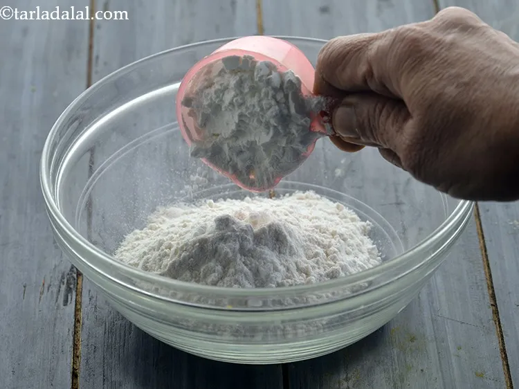 Step 13 – Add the cornflour. Cornflour helps in making cauliflower cripsier.