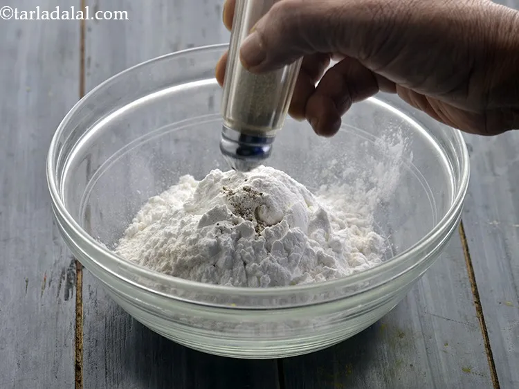 Step 14 – Next add freshly ground black pepper to provide maximum flavours to the batter.