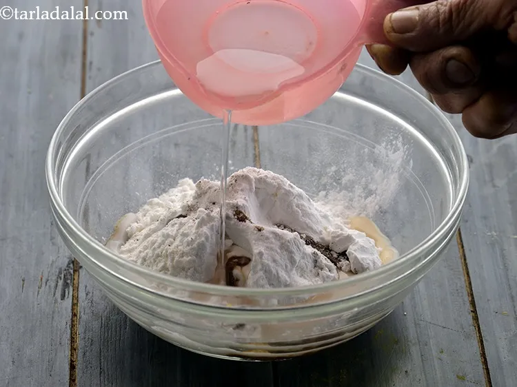 Step 17 – Gradually add water and whisk to prepare a coating consistency batter. Ensure the batter is …