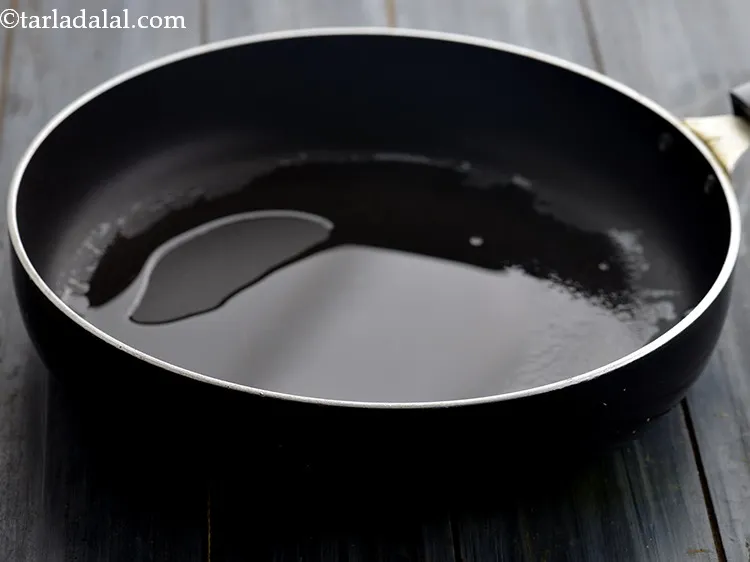 Step 27 – Heat the oil in a broad non-stick pan. A wok is ideal for tossing Indo-Chinese …
