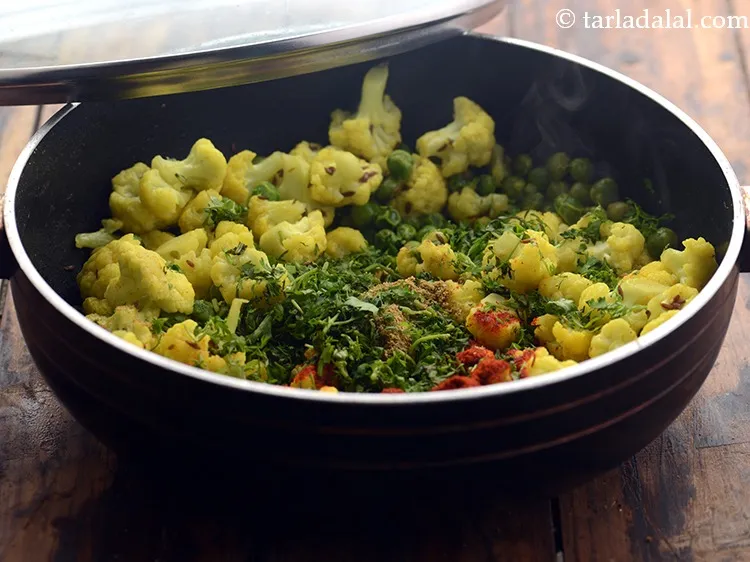 Step 13 – Add coriander. We have kept this gobi matar recipe very simple without adding onions, ginger-garlic …