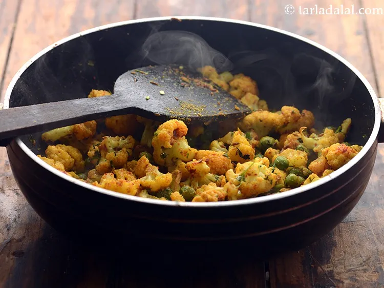 Step 14 – Mix well and cook on a medium flame for 2 minutes, while stirring occasionally. This …