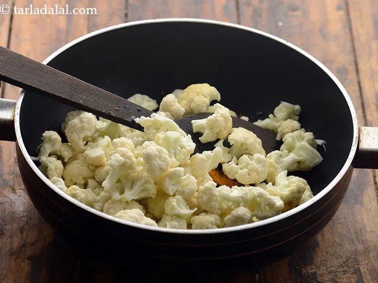 Step 7 – Add cauliflower.