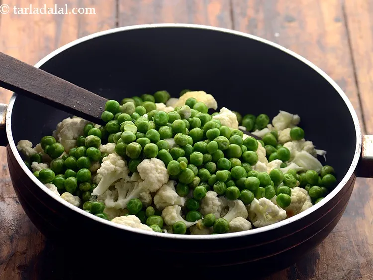 Step 8 – Add green peas. If using fresh green peas, then remove them from the pods and …
