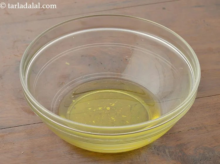 Step 4 – Next in a deep microwave safe bowl add 4 tbsp of ghee.&nbsp;