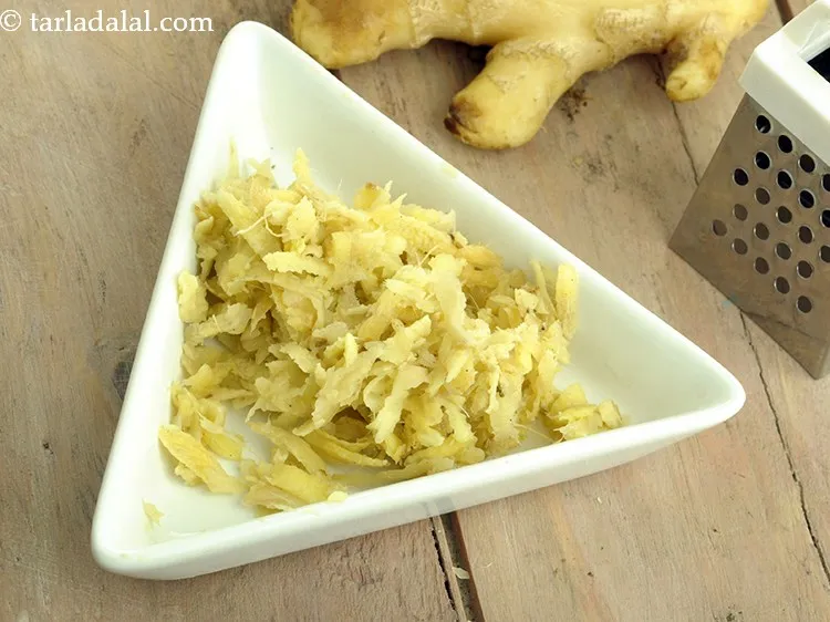 Step 5 – Add 1 tsp&nbsp;<a href="https://www.tarladalal.com/glossary-grated-ginger-943i">grated ginger (adrak)</a>.
