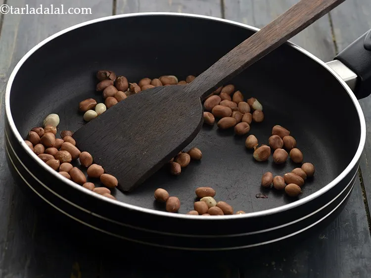 Step 4 – To make&nbsp;<strong>Green Chilli Thecha&nbsp;</strong><strong>(</strong><strong>Maharashtrain&nbsp;</strong><strong>Hirvi Mirchi Cha Thecha), </strong>heat a small non-stick pan, add the peanuts …