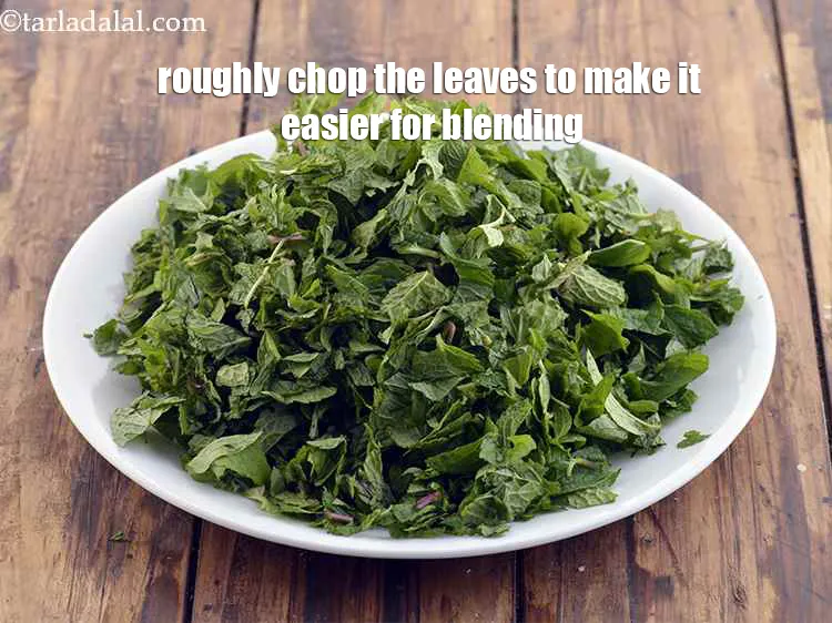 Step 11 – Roughly chop the leaves to make it easier for blending. We will need around 2 …
