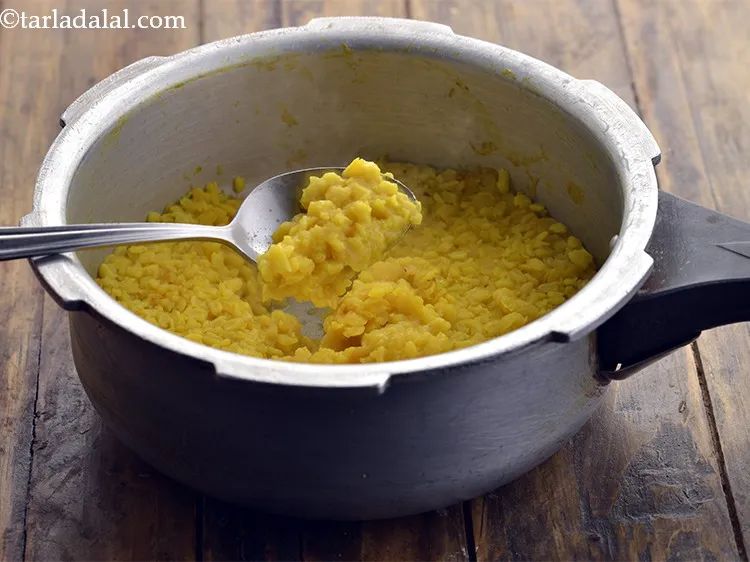 Step 23 – Mix well and pressure cook for 3 whistles. Allow the steam to escape naturally before …