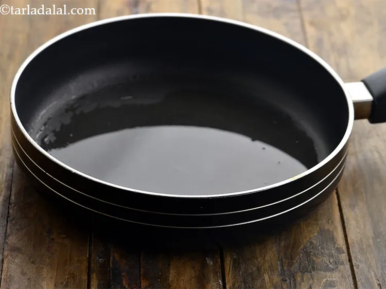 Step 24 – Heat the oil in a broad non-stick pan. Ghee or butter can be used as …