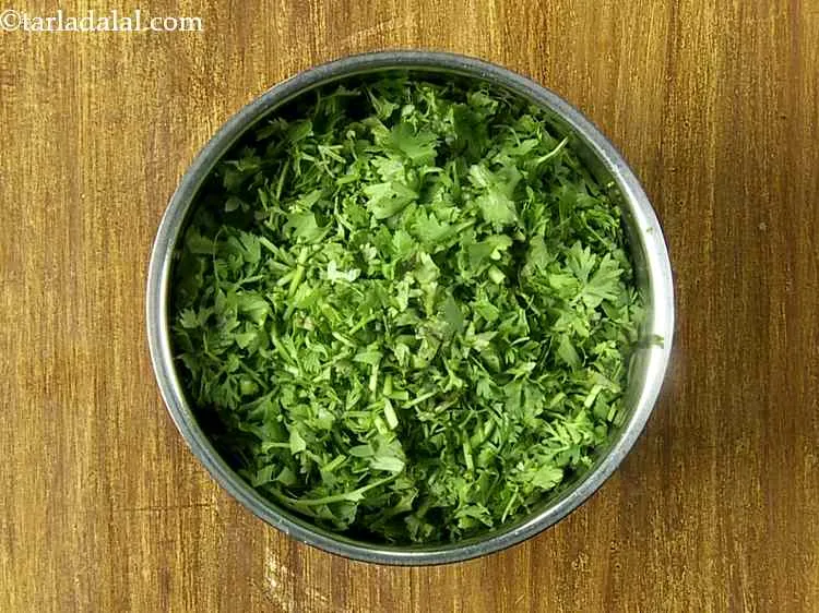 Step 5 – In a small mixer jar, add the coriander.