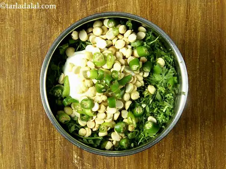 Step 8 – Add 2 roughly chopped green chillies. You can add more or less as per your …