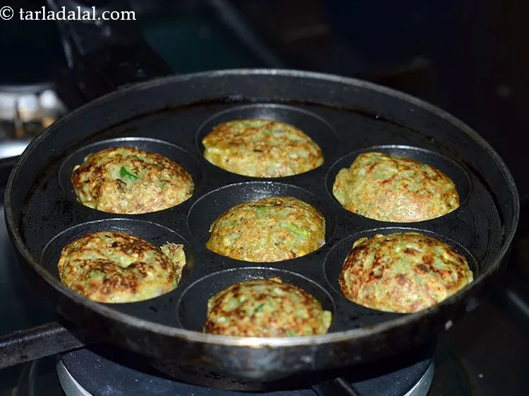 Step 20 – Turn each appe upside down using a fork so as to cook them from the …