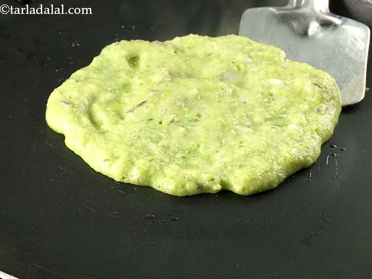 Step 16 – Cook the&nbsp;<strong>Green Peas Pancake</strong>&nbsp;on one side.
