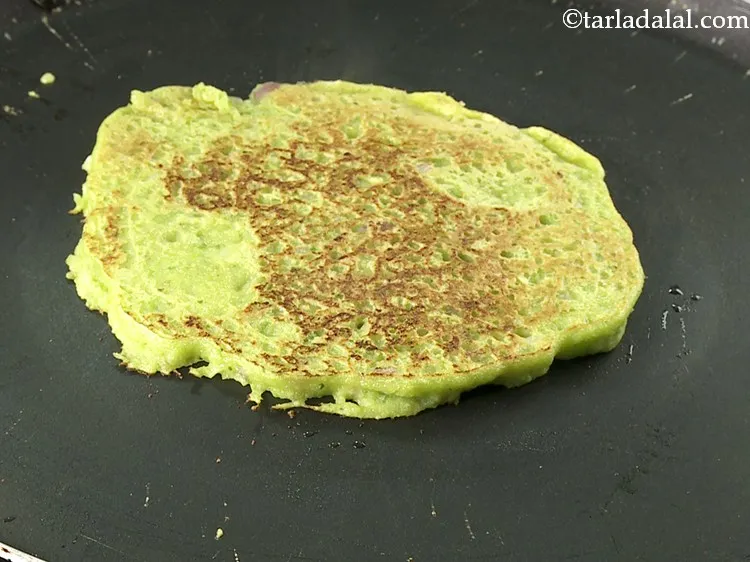 Step 17 – Flip and cook using &frac14; tsp of oil. Press it lightly with the help of …