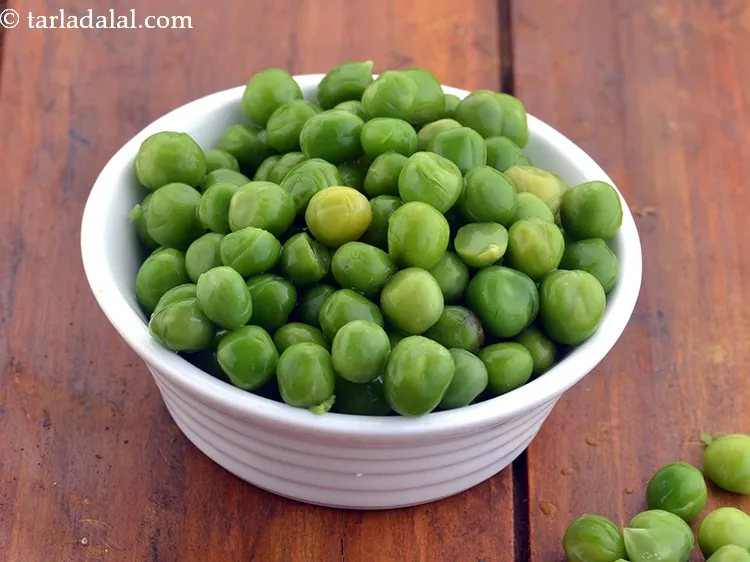 Step 41 – Add 1/2 cup&nbsp;<a href="https://www.tarladalal.com/glossary-boiled-green-peas-1078i">boiled green peas</a>.