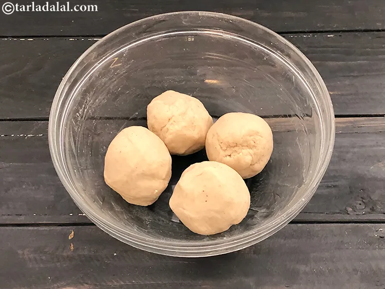 Step 8 – Divide the dough into 4 equal portions and keep aside.