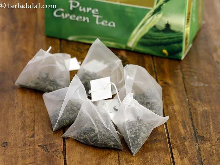 Step 12 – <p>Add 2&nbsp;<a href="https://www.tarladalal.com/glossary-green-tea-bags-2376i">green tea bags</a>. <span style="background-color:rgb(255,255,255);color:rgb(0,0,0);">The earthy or grassy undertones of green tea can …