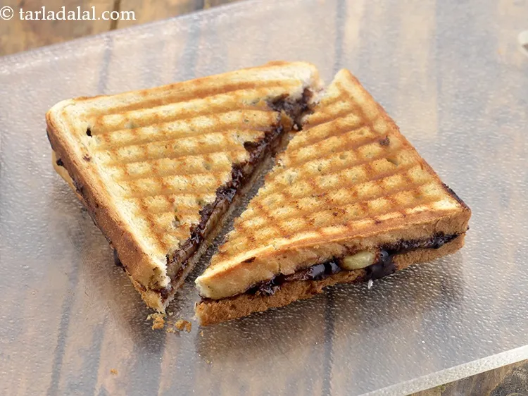 Step 10 – Cut each sandwich diagonally into 2 equal pieces.