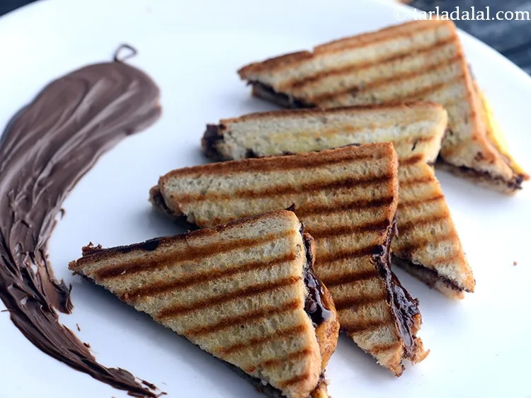 Step 9 – Serve&nbsp;<strong>grilled chocolate cheese sandwich | cheese chocolate&nbsp;Nutella&nbsp;&nbsp;sandwich | grilled chocolate sandwich |</strong>&nbsp;immediately.