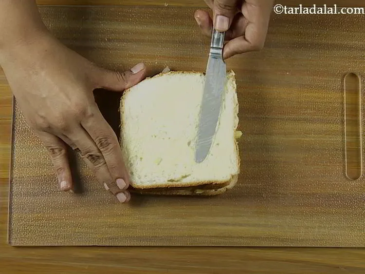 Step 16 – Brush 1 tsp of butter on top of the bread.