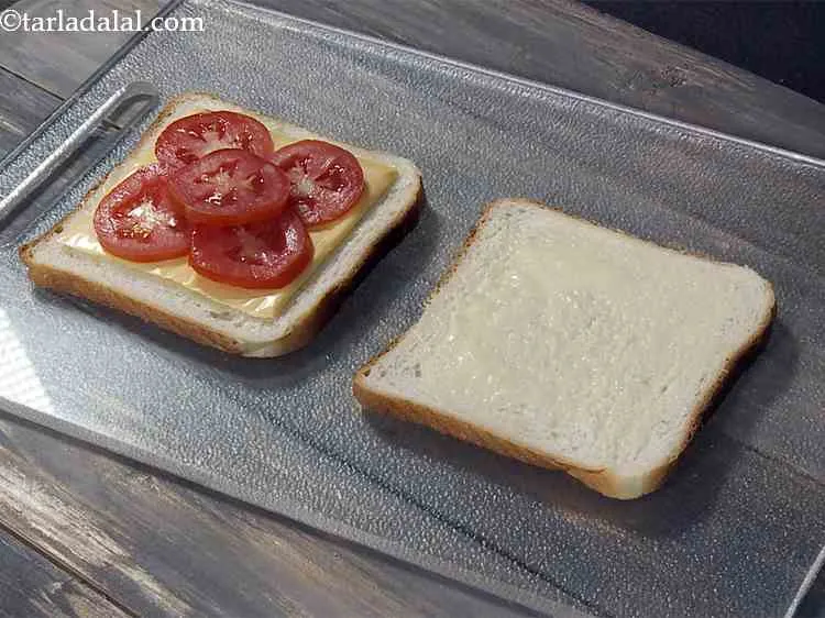 Step 5 – Top it with 5 tomato slices.