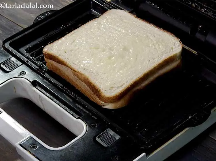 Step 12 – Place the sandwich in a greased and hot griller. You can even toast this on …