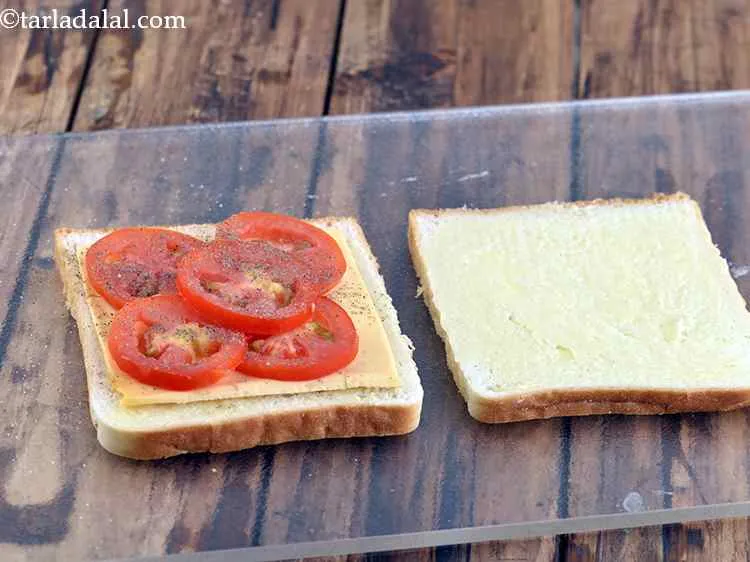 Step 6 – For seasoning, sprinkle salt and pepper evenly over it. Also, you can sprinkle mixed herbs.