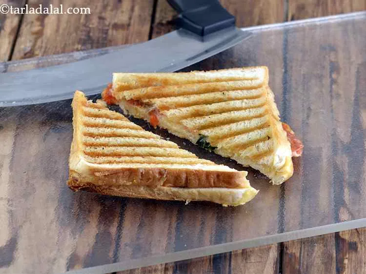 Step 14 – Cut the sandwich diagonally into 2 equal parts. Repeat steps 2 to 13 to make …