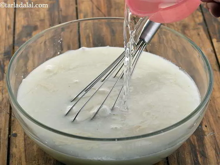 Step 6 – Add 4 cups of chilled water and whisk well. Keep aside. If not chilled water …