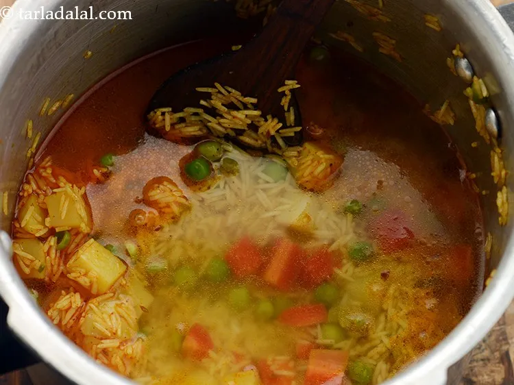 Step 19 – Add 3&frac12; cups of hot water and salt.