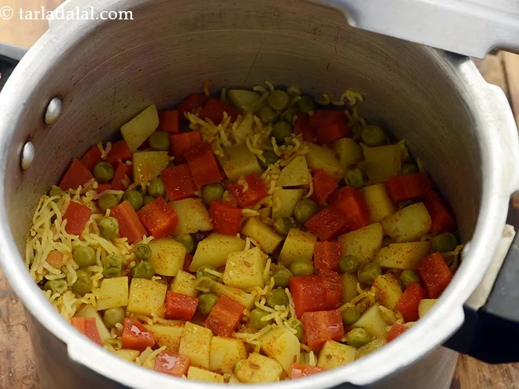 Step 21 – Close the lid and pressure cook for 2 whistles.