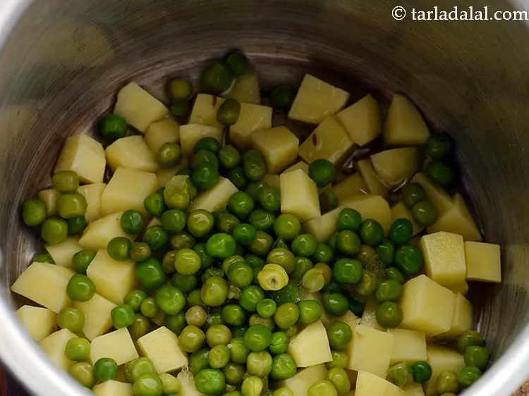Step 11 – Add green peas.