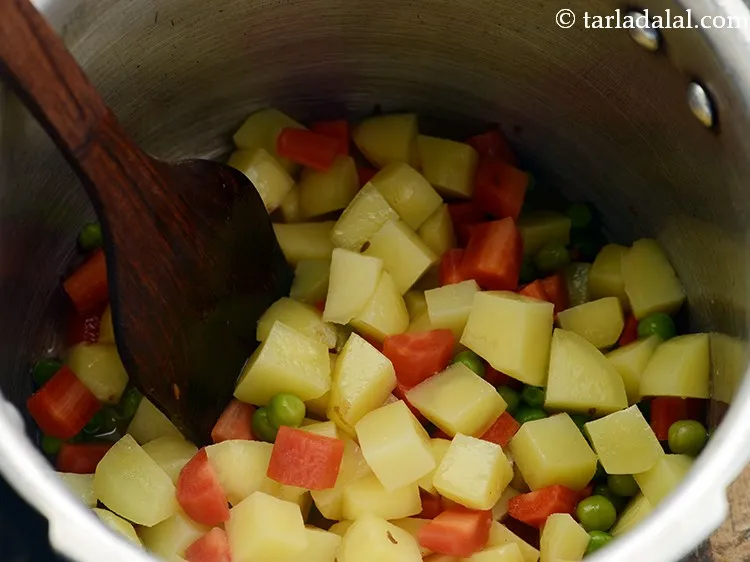 Step 13 – Add salt enough to season the veggies. It also fastens the cooking process of the …