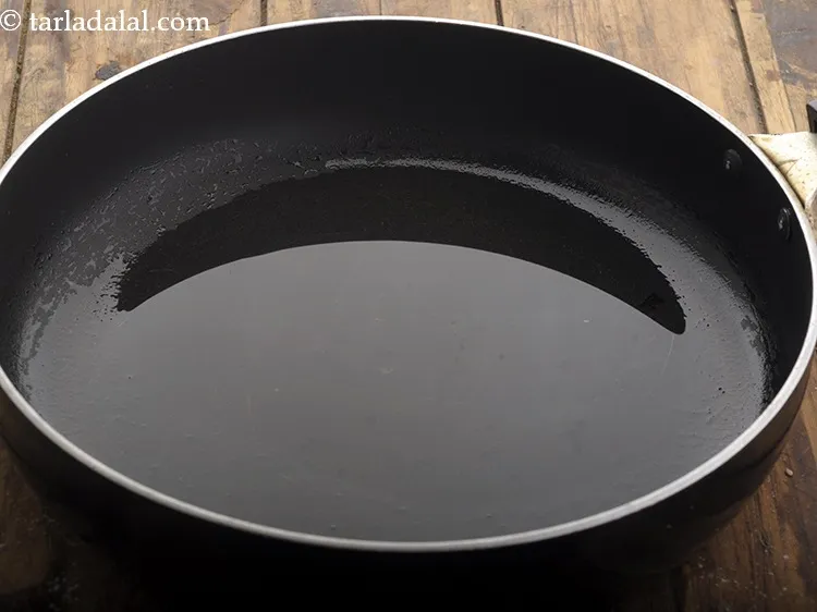 Step 7 – To make&nbsp;<strong>Indian style hakka noodles</strong>, heat the oil in a wok or frying pan over …