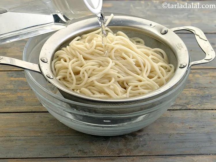 Step 5 – Refresh&nbsp;<strong>Boiled Noodles</strong>&nbsp;under cold water so they do not stick to each other and the internal …