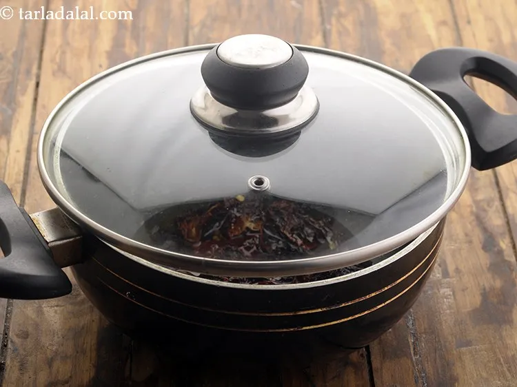 Step 4 – Then cover the pan with a lid and switch off the flame.