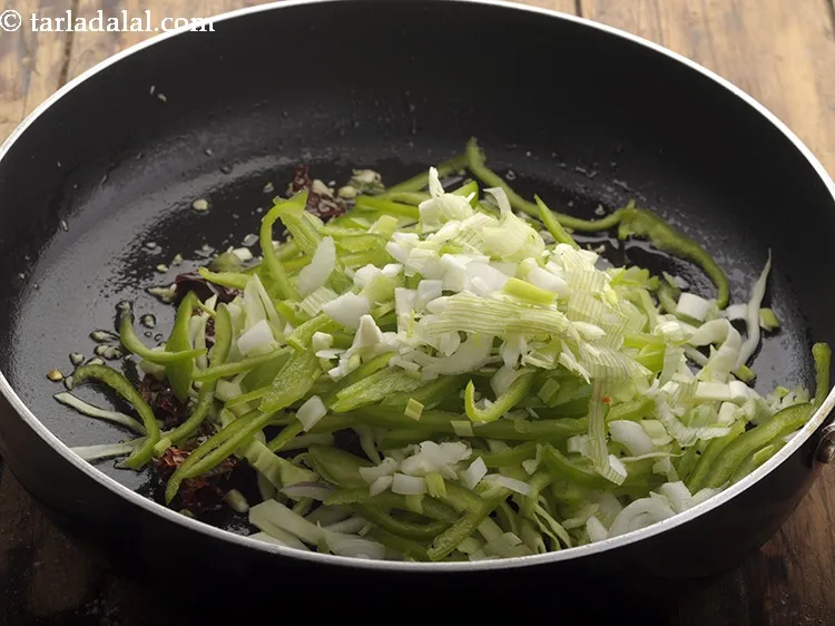 Step 13 – Add spring onion whites
