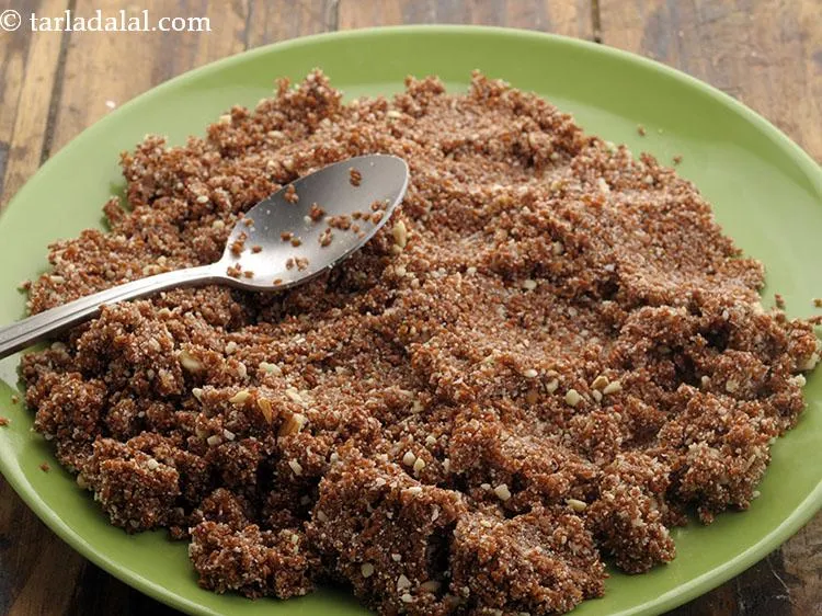 Step 15 – Transfer the mixture onto a plate and keep aside to cool slightly.