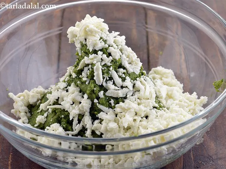 Step 19 – To it add grated paneer. This gives a really nice texture to the kebabs.