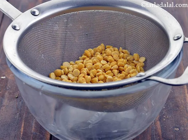 Step 6 – Drain the chana dal to get rid of the excess water.