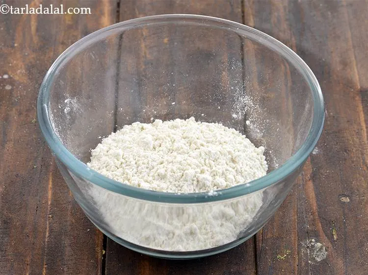 Step 25 – Take 1/4 cup of plain flour in a bowl.